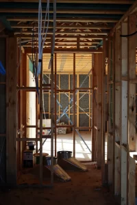 Detailed frame inspection showing internal timber framing and structural elements assessed for compliance during construction